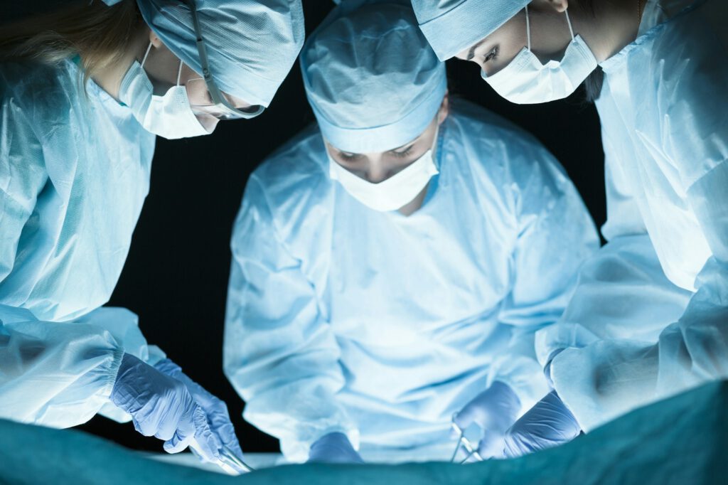 Medical team performing operation